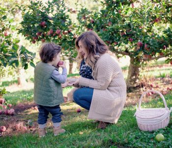 mother son apple picking